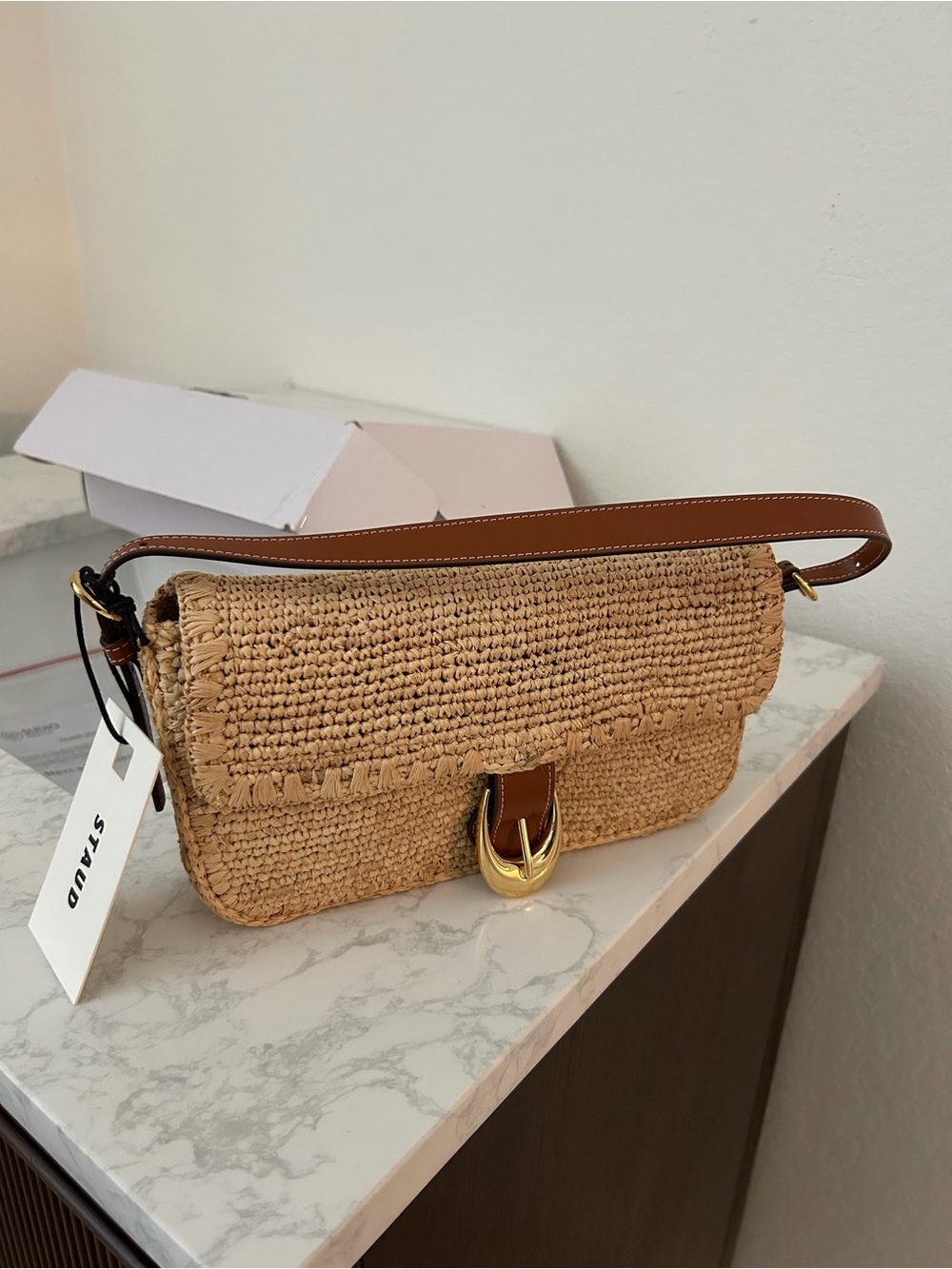 STAUD Tan Raffia Crossbody with Brown Leather Strap and Gold Buckle